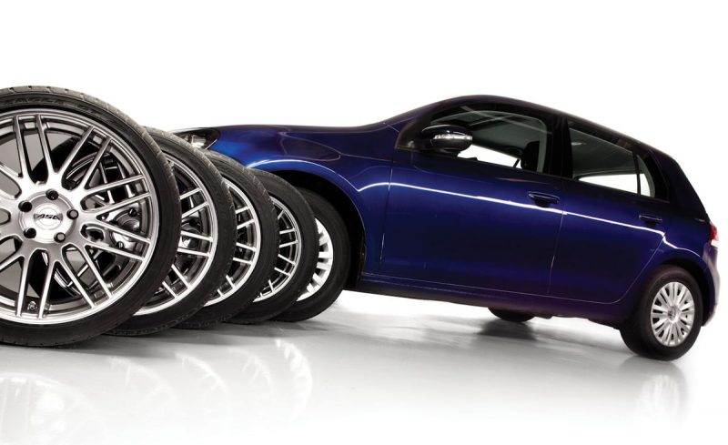 Different tires with a blue car