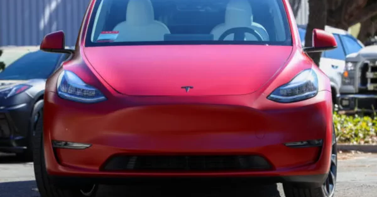 Front of a red tesla model y