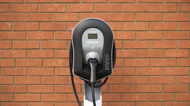 a black wall mounted electric vehicle charger