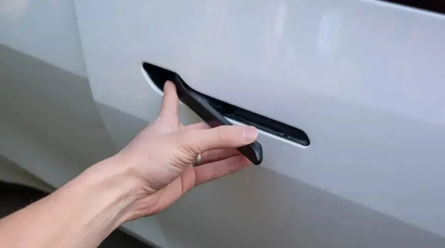 How do Tesla door handles work