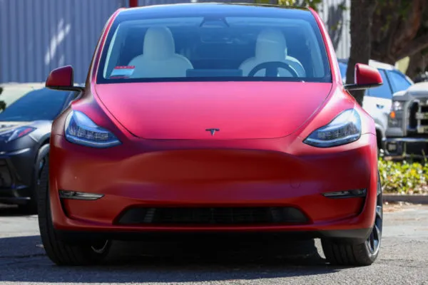 Front of a red tesla model y